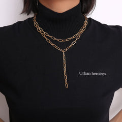 Chic 18K gold-plated layered lariat necklace with a long chain and a distinctive link, perfect for any outfit.