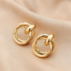 Stunning 18K gold-plated stud earrings with a unique twisted design, ideal for elevating any outfit with elegance.