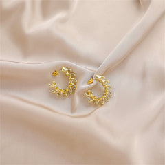 Dazzling 18K gold-plated hoop earrings showcasing lovely leaf accents, a must-have for a trendy and sophisticated look.