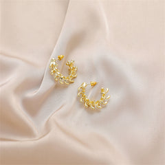 Stunning 18K gold-plated hoop earrings adorned with leaf motifs, ideal for elevating any outfit with a natural elegance.