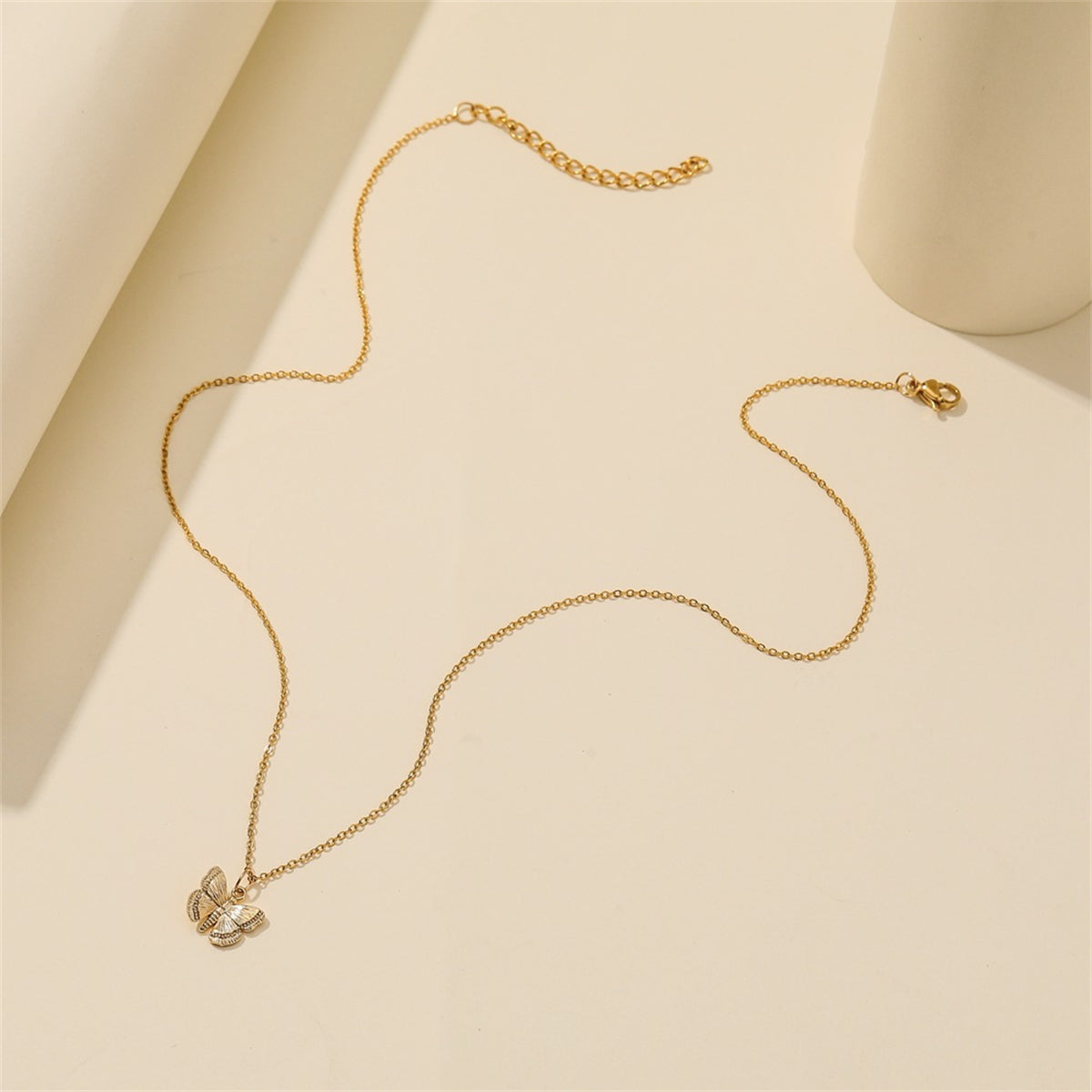 Gorgeous 18K gold-plated butterfly pendant necklace displayed on a white background, perfect for adding a touch of elegance.