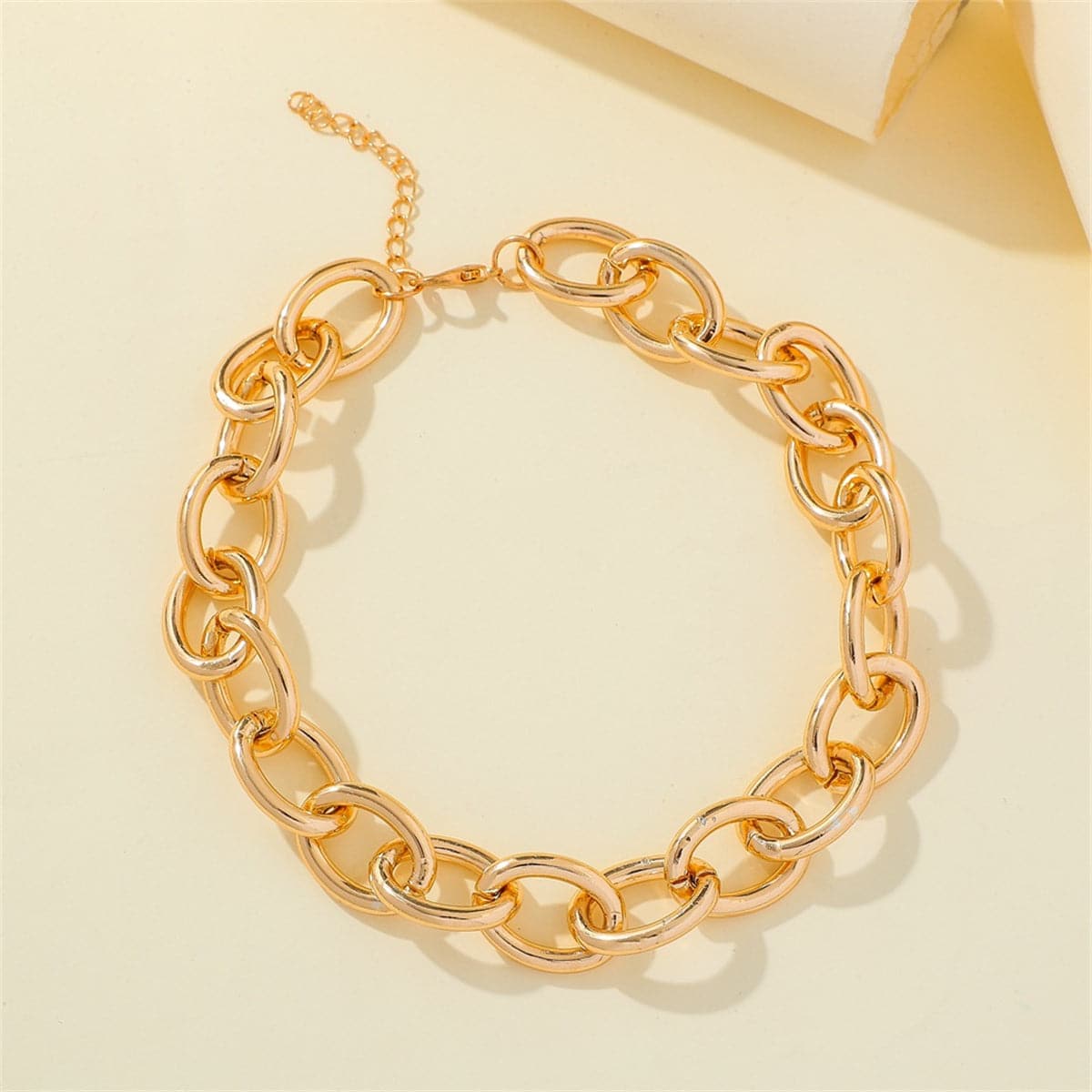18K gold-plated cable chain necklace showcasing a distinctive large link, perfect for adding elegance to any outfit.