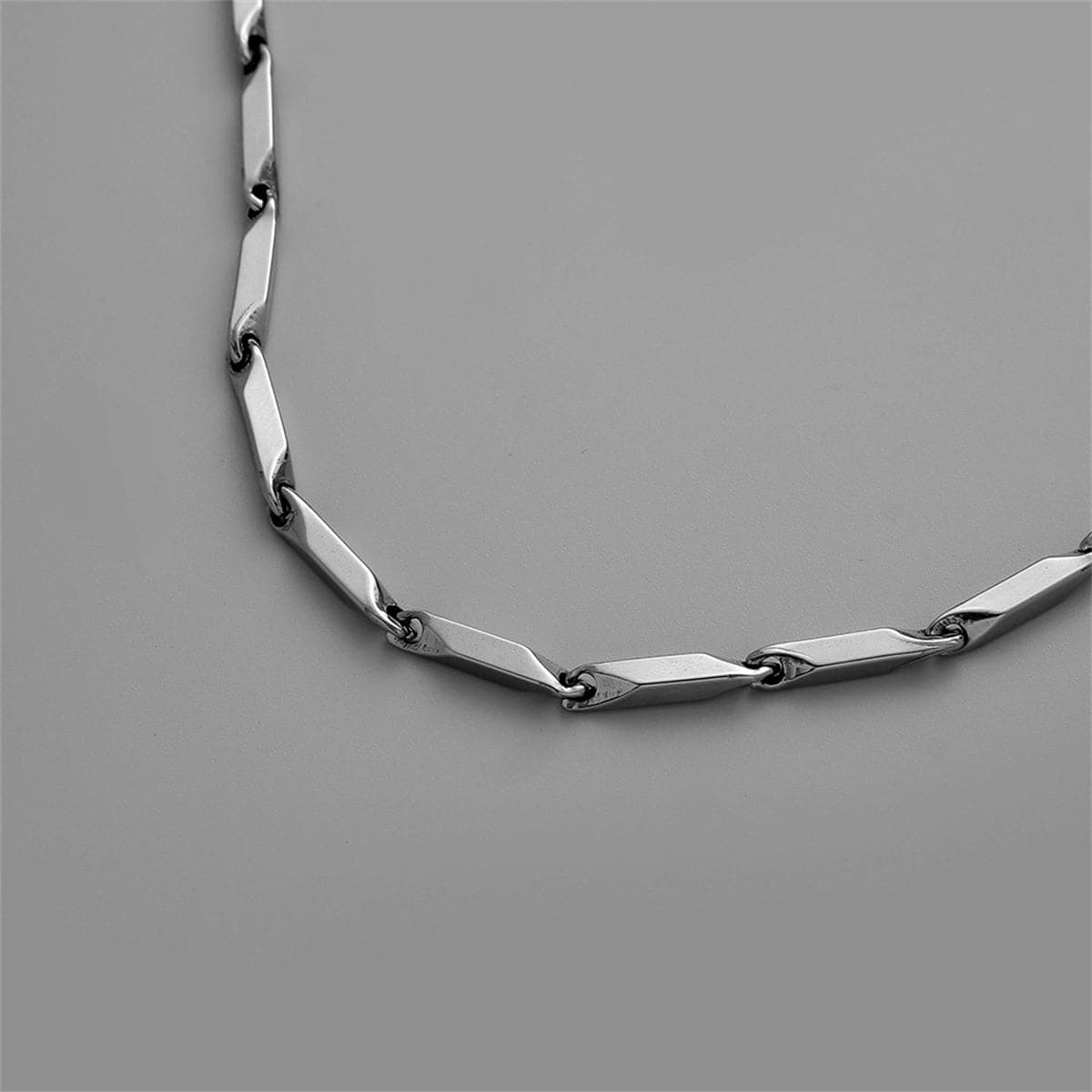 Silver-Plated Geometric Chain Necklace, silver pendant necklace for women, vintage-inspired design, side view