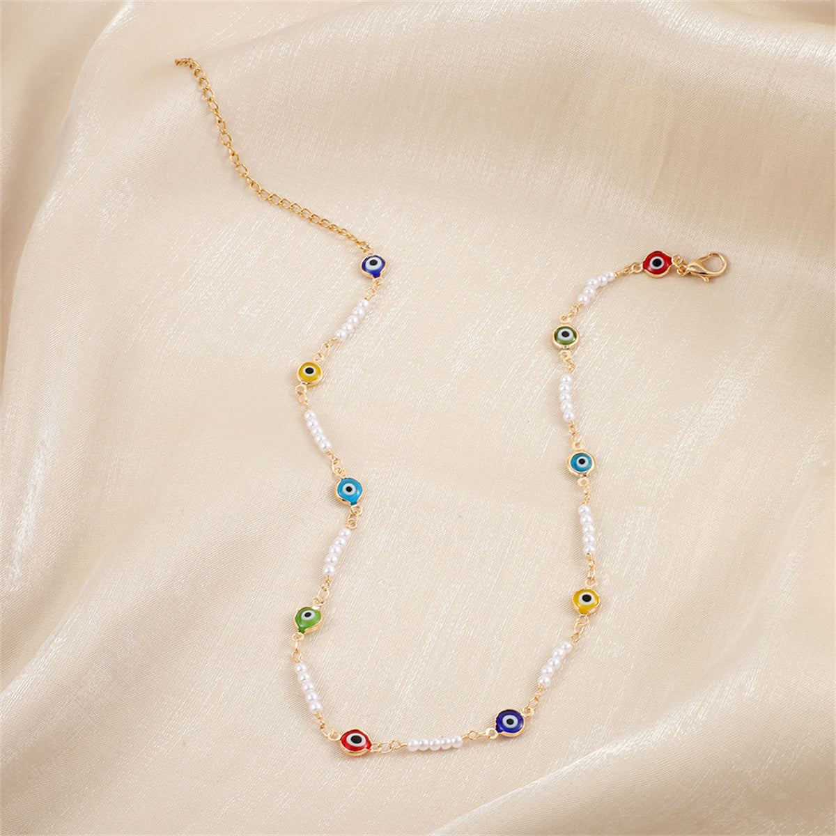 Blue Acrylic and Pearl 18K Gold-Plated Eye Station Necklace, gold pendant necklace for women, detail close-up