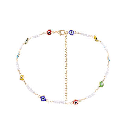 Blue Acrylic and Pearl 18K Gold-Plated Eye Station Necklace, gold pendant necklace for women, botanical inspired, side view