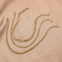 Three beautiful 18K gold-plated curb chain anklets with stylish chain links, a timeless addition to your accessory lineup.
