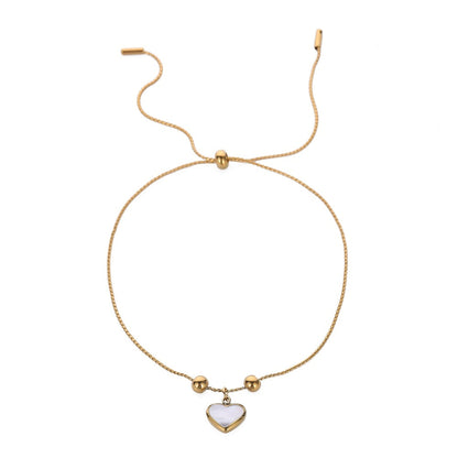 White Shell and 18K Gold-Plated Heart Charm Adjustable Bracelet, gold bracelet for women, everyday style, side view