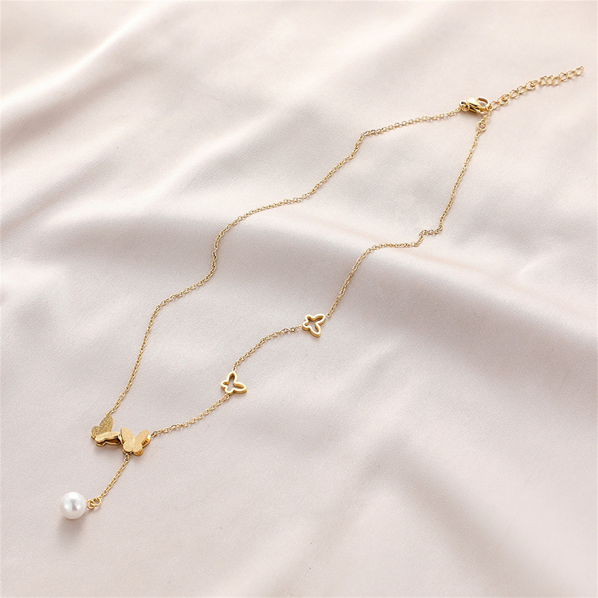 Pearl and 18K Gold-Plated Frosted Butterfly Lariat Necklace, gold pendant necklace for women, everyday style, detail close-up