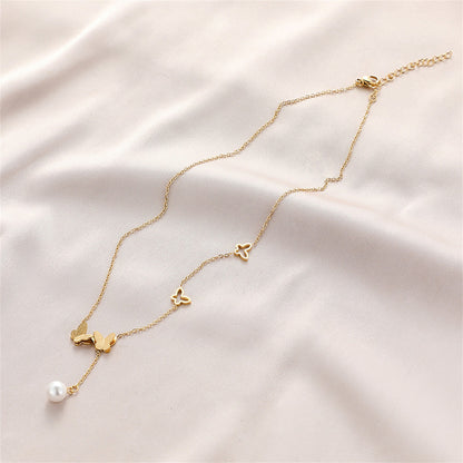 Pearl and 18K Gold-Plated Frosted Butterfly Lariat Necklace, gold pendant necklace for women, everyday style, detail close-up