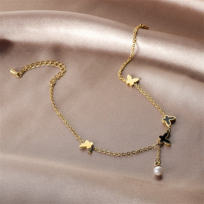 Black Acrylic and Pearl 18K Gold-Plated Butterfly Anklet, gold anklet bracelet, botanical inspired, detail close-up
