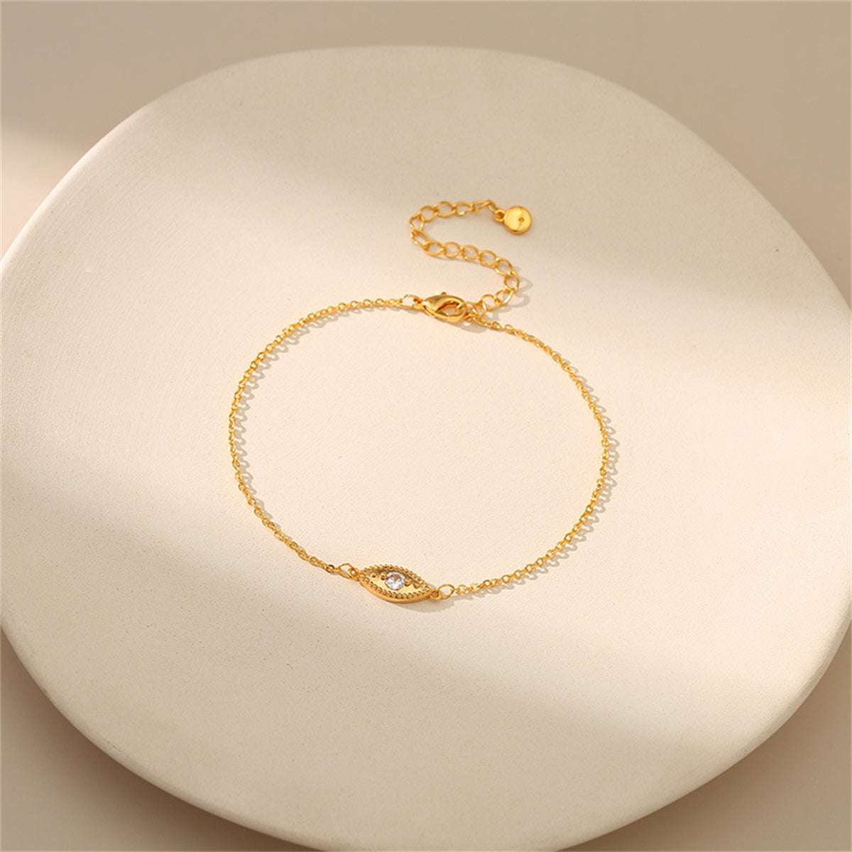 Cubic Zirconia and 18K Gold-Plated Eye Charm Anklet, gold anklet bracelet, vintage-inspired design, detail close-up