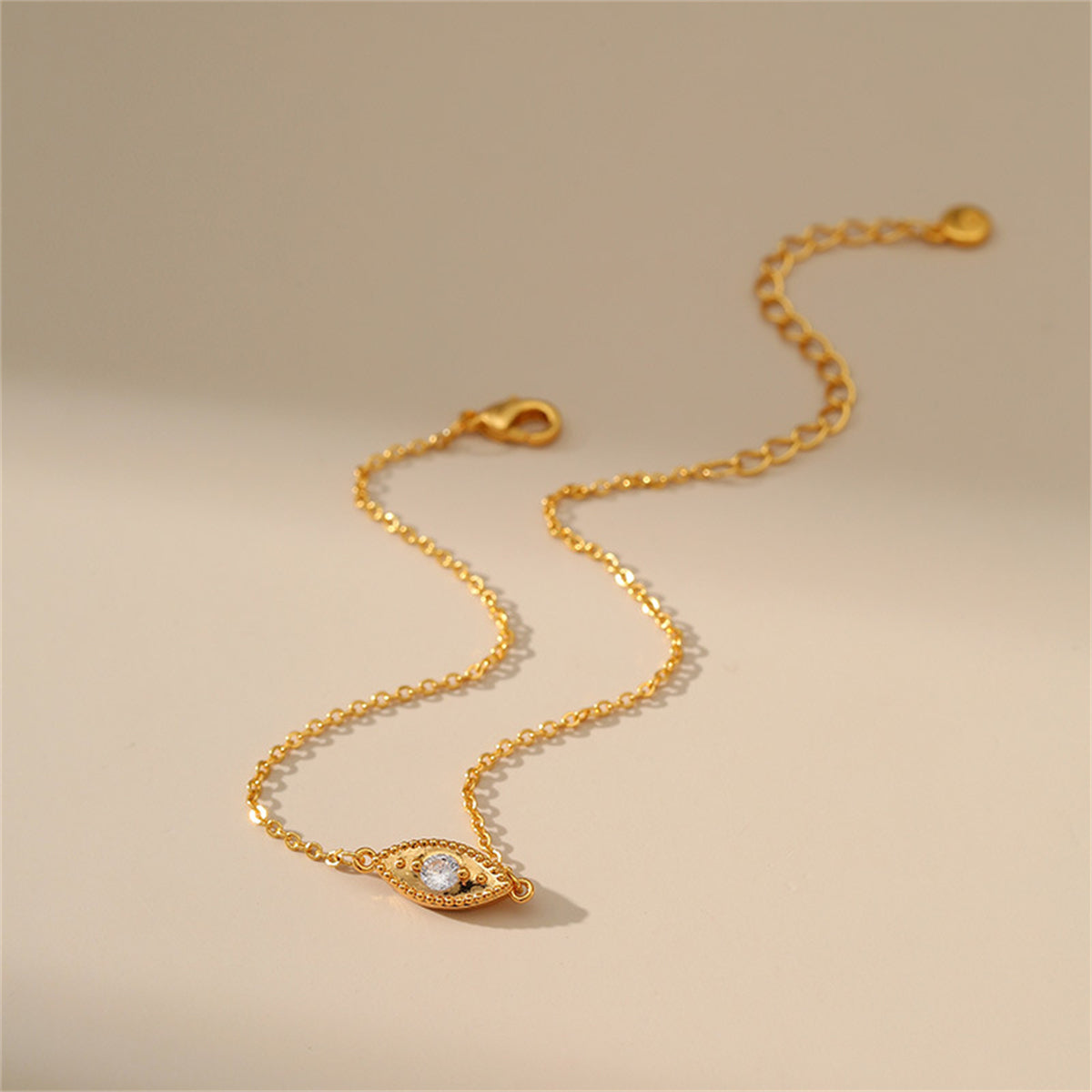 Cubic Zirconia and 18K Gold-Plated Eye Charm Anklet, gold anklet bracelet, vintage-inspired design, side view