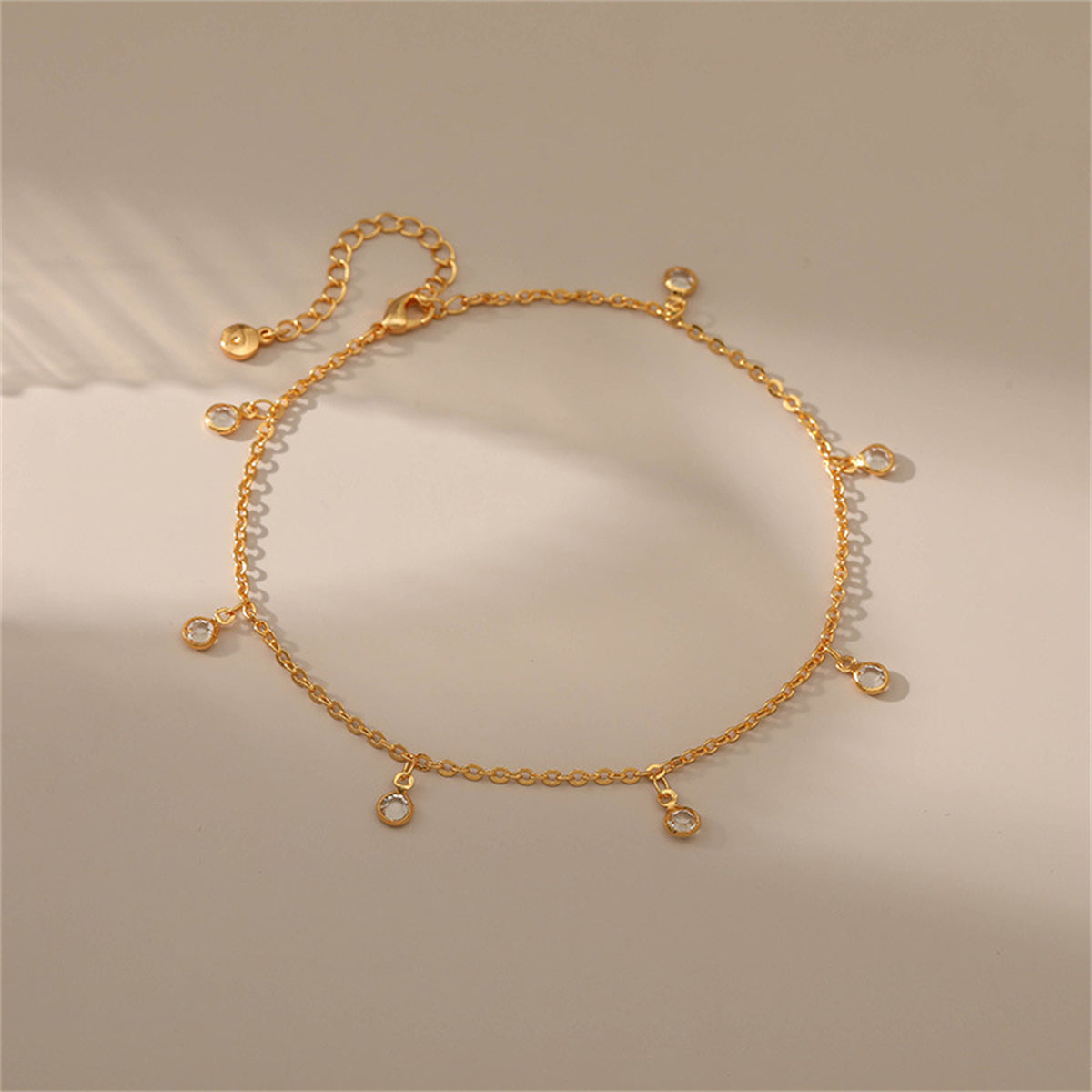 Cubic Zirconia and 18K Gold-Plated Tassel Anklet, gold anklet bracelet, vintage-inspired design, detail close-up