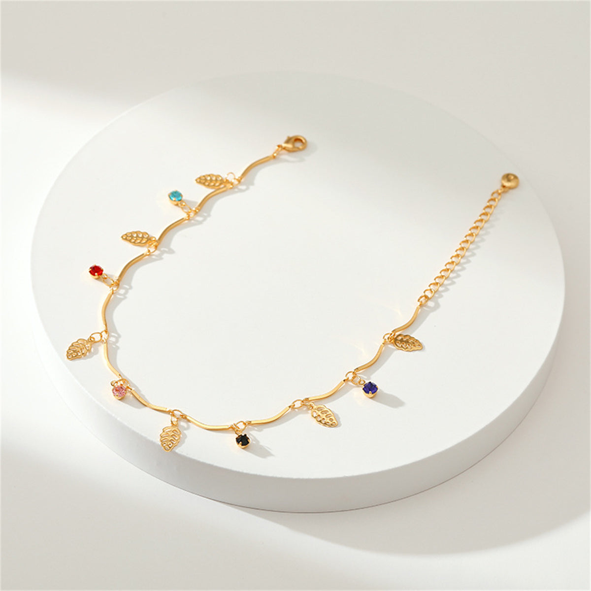 Cubic Zirconia and 18K Gold-Plated Leaves Station Anklet, gold anklet bracelet, vintage-inspired design, detail close-up