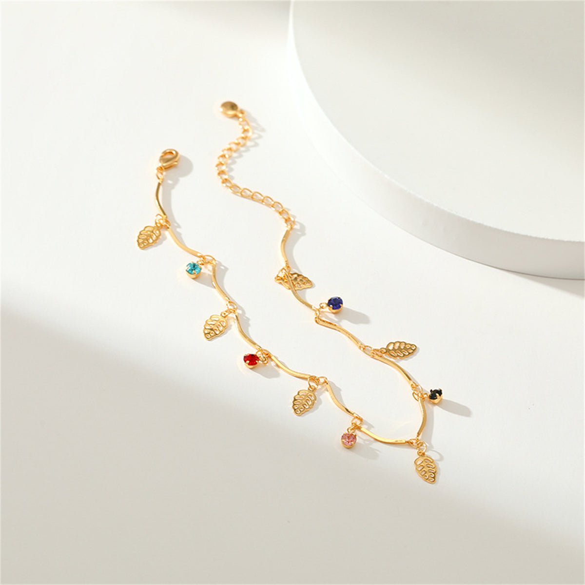 Cubic Zirconia and 18K Gold-Plated Leaves Station Anklet, gold anklet bracelet, vintage-inspired design, lifestyle look