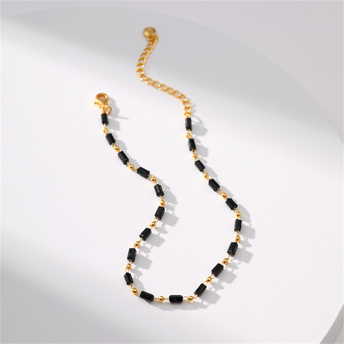 Black Acrylic and 18K Gold-Plated Beaded Anklet, gold anklet bracelet, vintage-inspired design, detail close-up