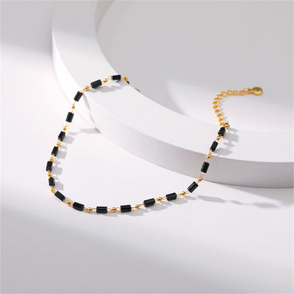 Black Acrylic and 18K Gold-Plated Beaded Anklet, gold anklet bracelet, vintage-inspired design, styled look