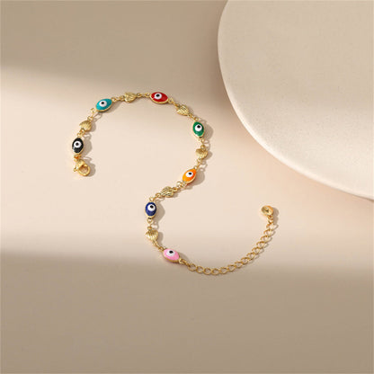 Blue Multicolor Enamel and 18K Gold-Plated Evil Eye Hearts Station Bracelet, gold bracelet for women, detail close-up