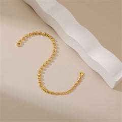 Chic 18K gold-plated bead chain bracelet presented on a white surface, accentuating its luxurious appeal and style.