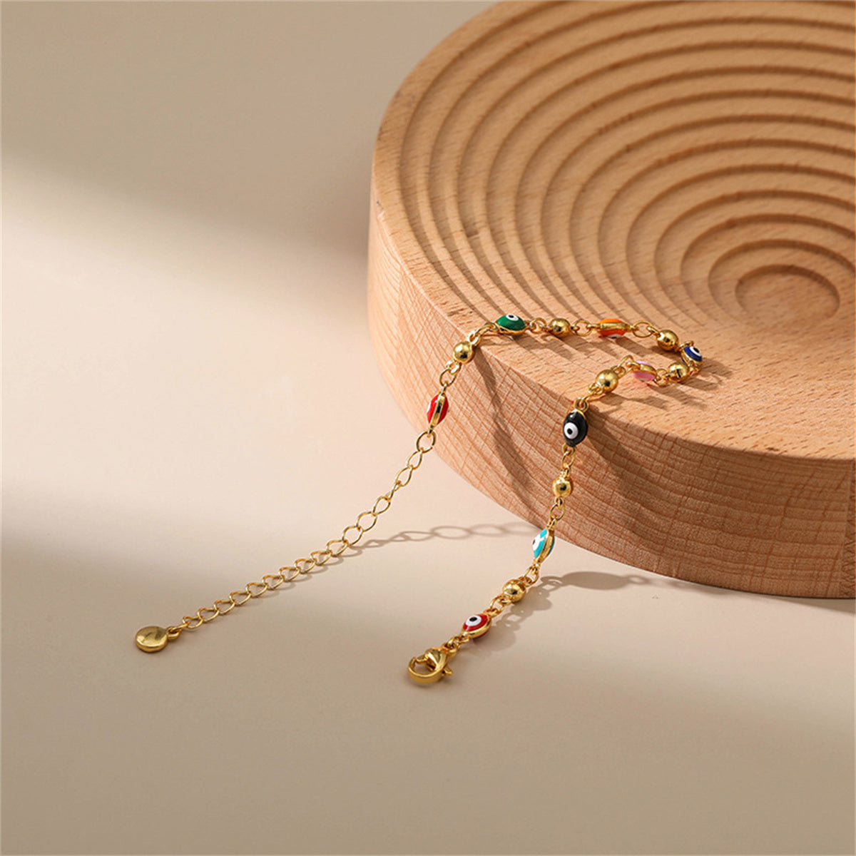 Red Enamel and 18K Gold-Plated Multicolor Evil Eye Station Bracelet, gold bracelet for women, detail close-up