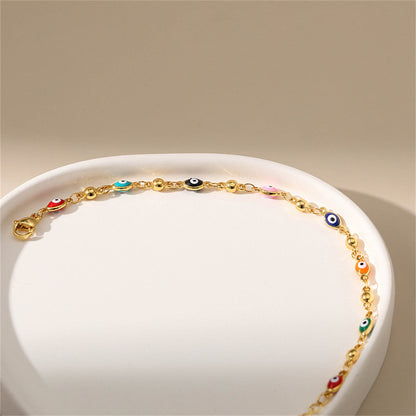 Red Enamel and 18K Gold-Plated Multicolor Evil Eye Station Bracelet, gold bracelet for women, lifestyle look