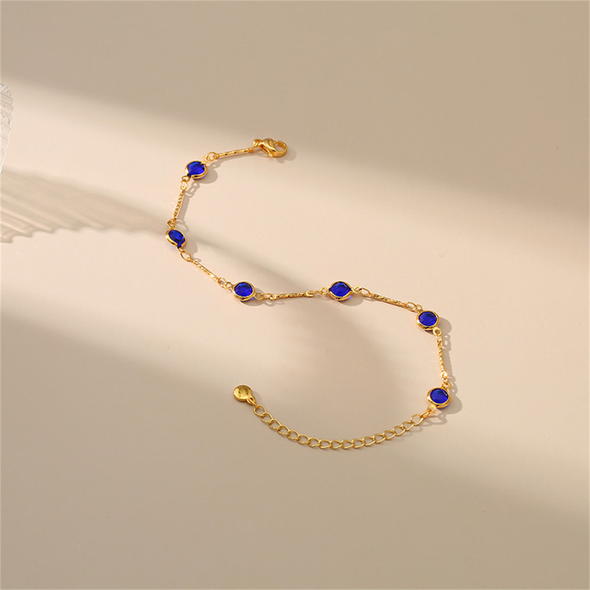 Purple Crystal and 18K Gold-Plated Station Bracelet, gold bracelet for women, everyday style, side view