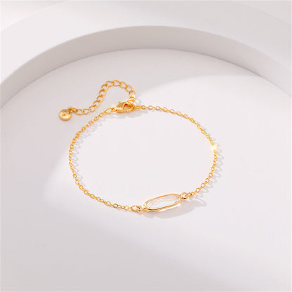 Crystal and 18K Gold-Plated Oval-Cut Charm Bracelet, gold bracelet for women, vintage-inspired design, detail close-up