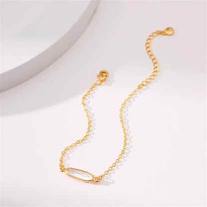 Crystal and 18K Gold-Plated Oval-Cut Charm Bracelet, gold bracelet for women, vintage-inspired design, lifestyle look