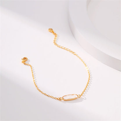 Crystal and 18K Gold-Plated Oval-Cut Charm Bracelet, gold bracelet for women, vintage-inspired design, side view