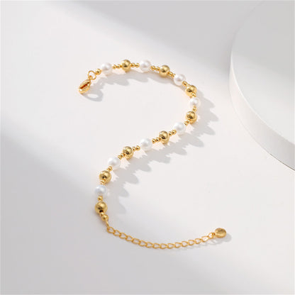 Pearl and 18K Gold-Plated Beaded Bracelet, gold bracelet for women, dainty minimalist design, lifestyle look