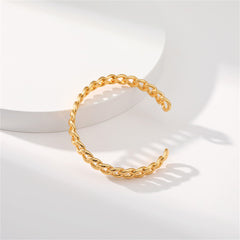 18K gold-plated cuff bracelet featuring a twisted design, exemplifying luxury and refined craftsmanship.