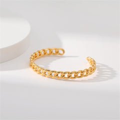 18K gold-plated cuff bracelet with a unique twisted design, perfect for adding a touch of elegance to any outfit.