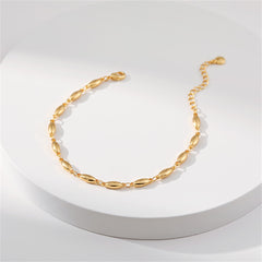 A stylish 18K gold-plated olive chain bracelet embellished with small oval beads, perfect for any occasion.