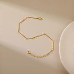 Chic 18K gold-plated bar station bracelet made from a single chain link, offering a sophisticated touch to your jewelry collection.
