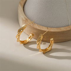 Stunning 18K gold-plated hoop earrings that elevate your style with their chic and modern design.