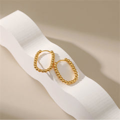 Dazzling 18k gold ball hoop earrings, featuring a fashionable beaded U-shape for a touch of elegance and style.