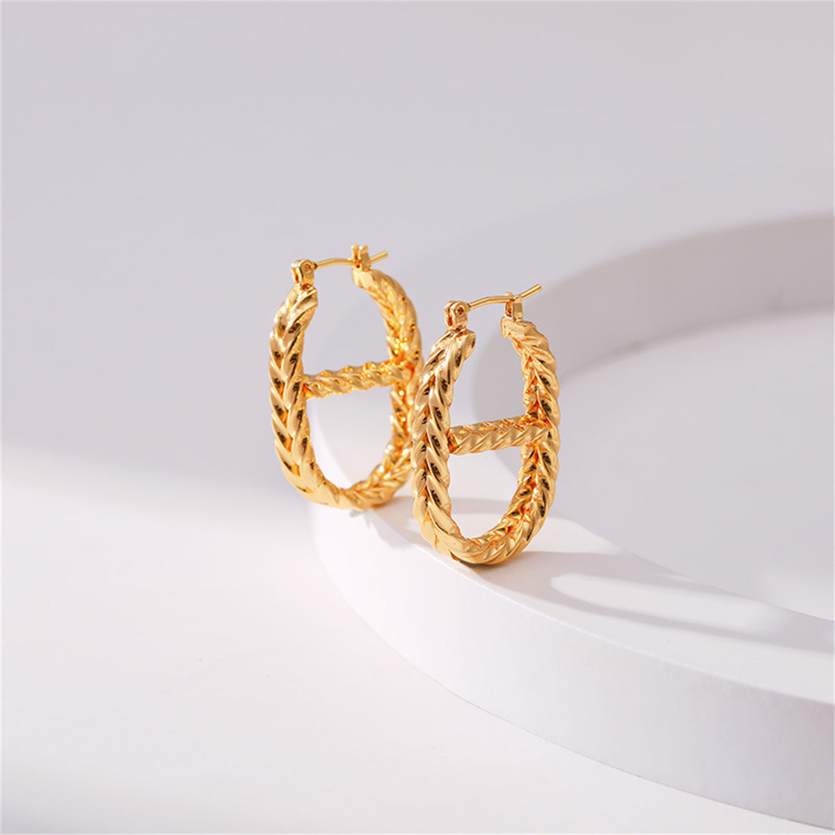 18K Gold-Plated Twine Oval Huggie Earrings, gold huggie earrings, everyday style, side view