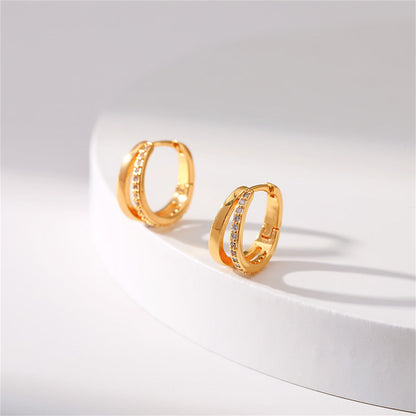 Cubic Zirconia and 18K Gold-Plated V-Shape Huggie Earrings, gold huggie earrings, dainty minimalist design, lifestyle look