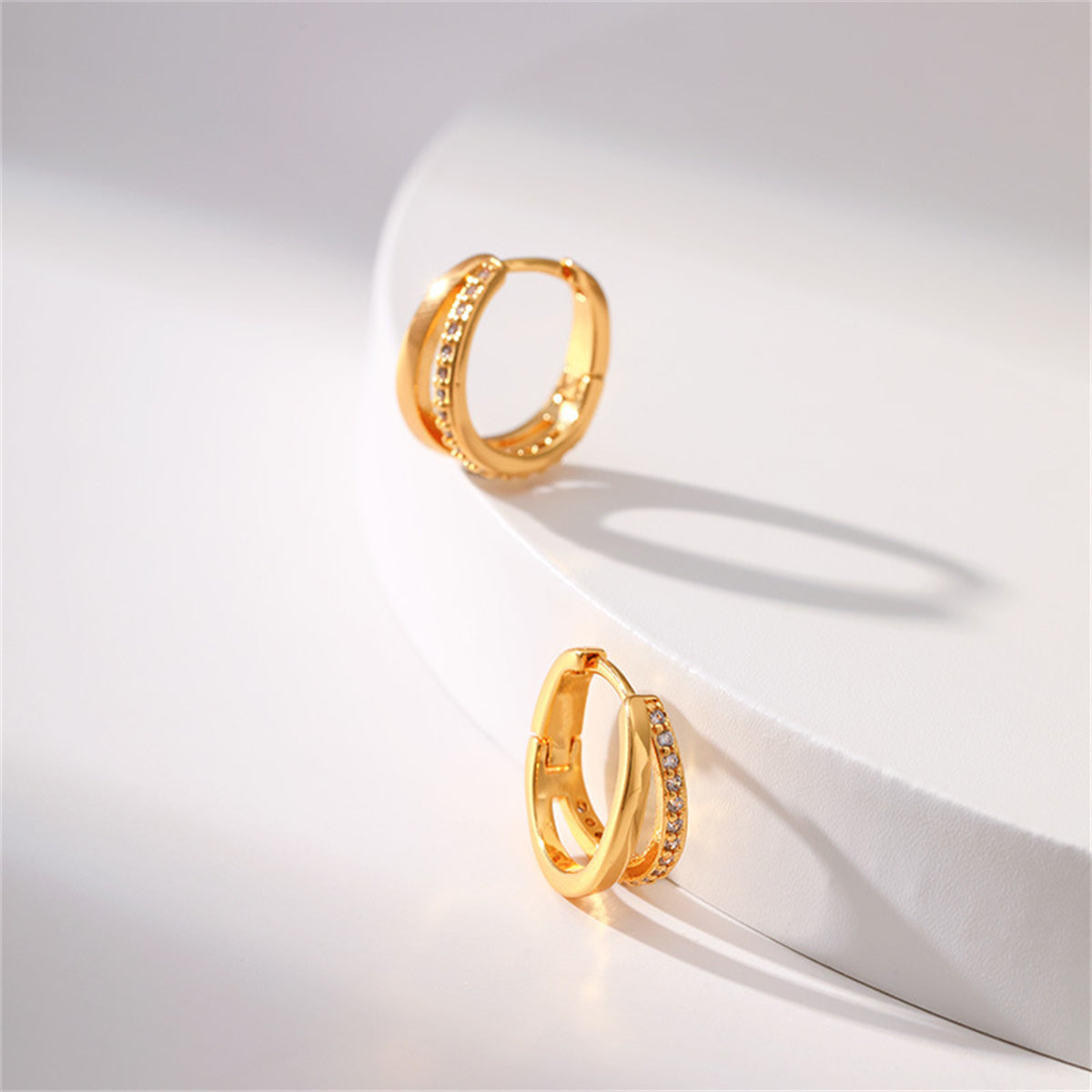 Cubic Zirconia and 18K Gold-Plated V-Shape Huggie Earrings, gold huggie earrings, dainty minimalist design, styled look