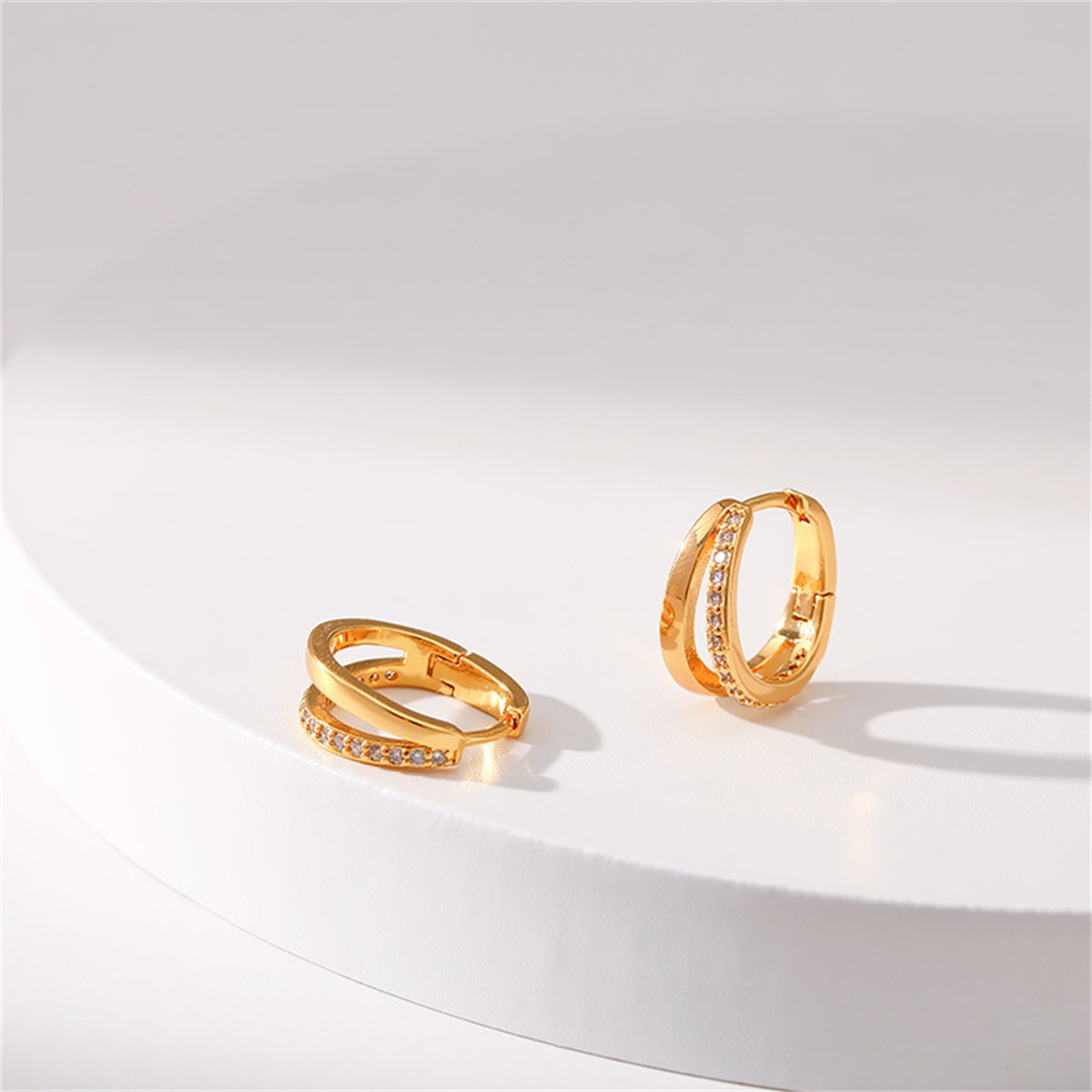 Cubic Zirconia and 18K Gold-Plated V-Shape Huggie Earrings, gold huggie earrings, dainty minimalist design, side view