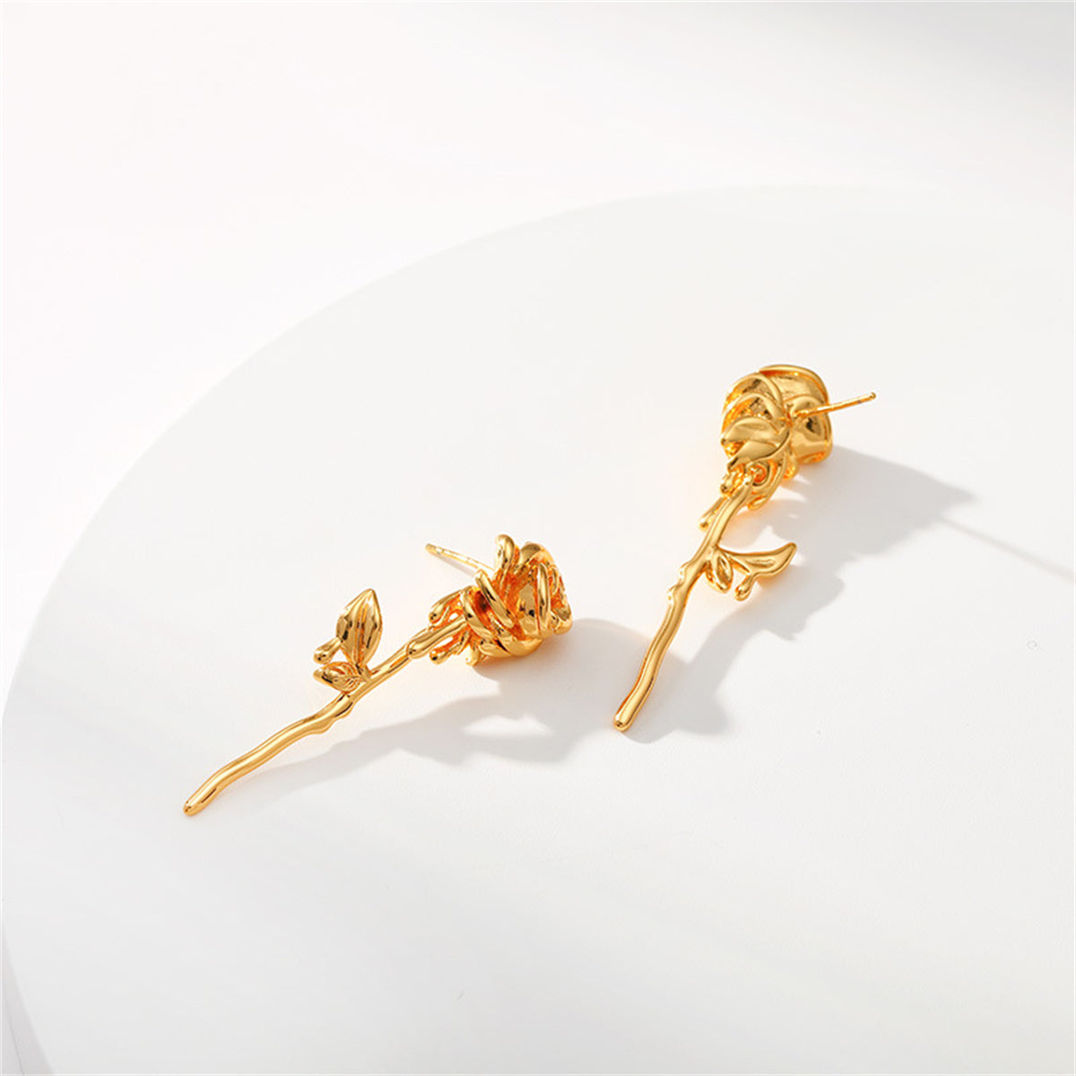 Exquisite 18K gold-plated rose drop earrings, perfect for adding a touch of elegance to any ensemble.