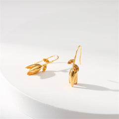 18K gold-plated earrings adorned with delicate leaves and floral motifs, showcasing exquisite craftsmanship.
