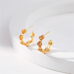 Beautifully crafted 18K gold-plated rose huggie earrings, offering a sophisticated touch to any jewelry collection.