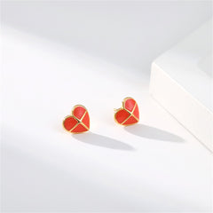 Red heart-shaped stud earrings made of red enamel, beautifully complemented by 18K gold plating.