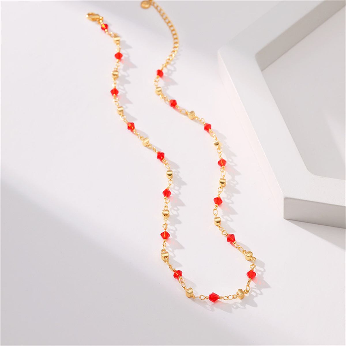 Red Acrylic and 18K Gold-Plated Station Necklace, gold pendant necklace for women, vintage-inspired design, lifestyle look