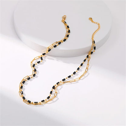 Black Acrylic and 18K Gold-Plated Layered Chain Necklace, gold pendant necklace for women, botanical inspired, front view