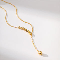 Exquisite 18K gold-plated bead lariat necklace with a shimmering diamond pendant.