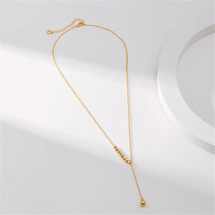 Elegant 18K gold-plated bead lariat necklace adorned with a brilliant diamond pendant.