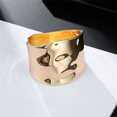 Stunning 18K gold-plated bangle with a bright, curved surface, perfect for adding elegance to your jewelry collection.