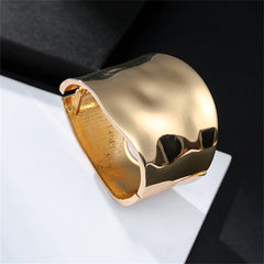 Beautifully crafted 18K gold-plated curved bangle bracelet, showcasing a radiant surface that enhances any ensemble.